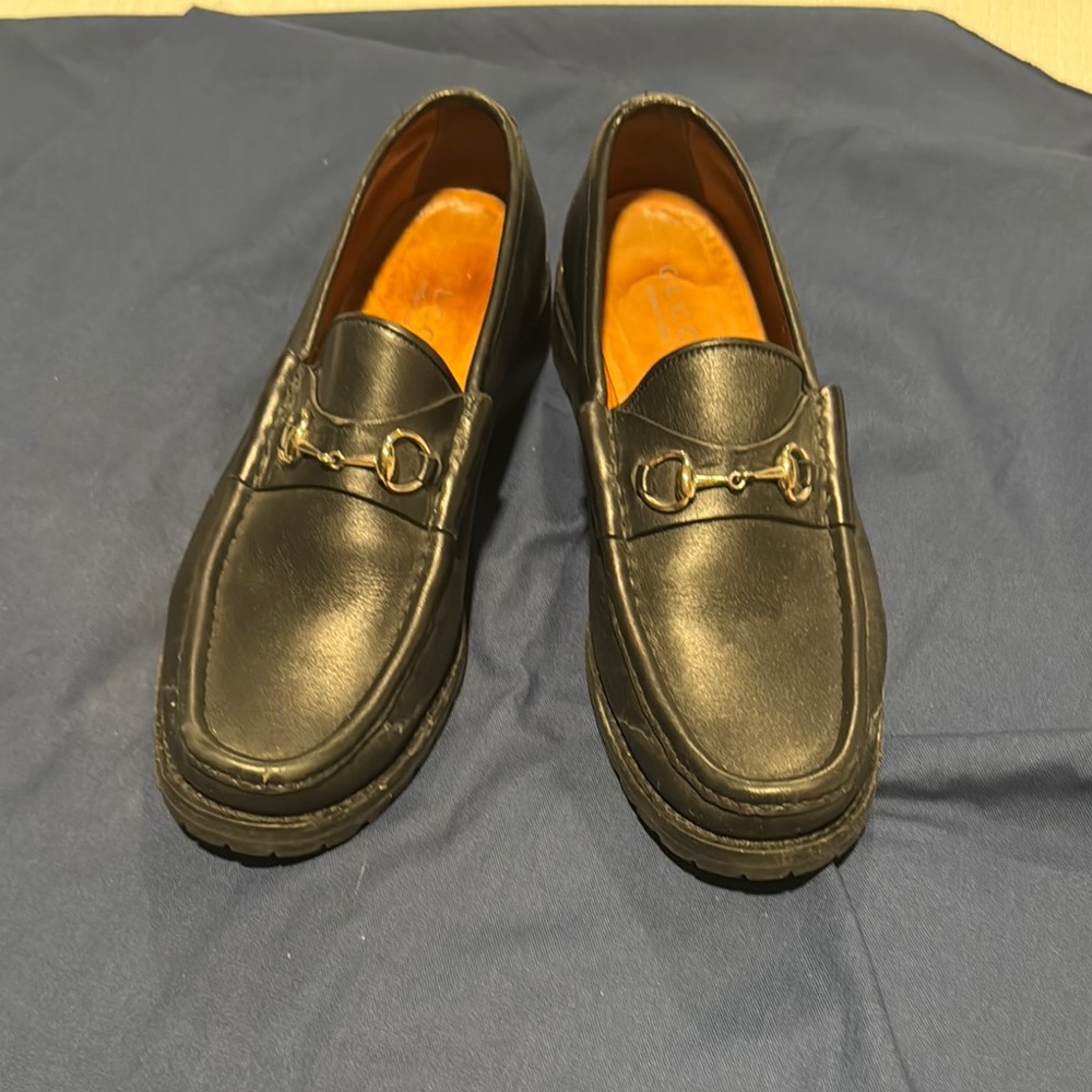 Gucci Black and Gold Loafers with Horsebit Design